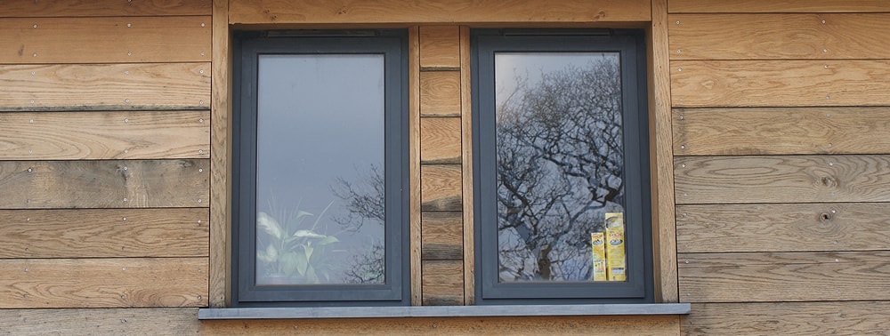 окна ПВХ в деревянных домах